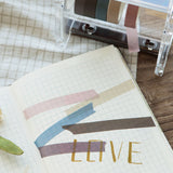 colourful washi tape used on a notebook