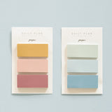 two sets of tri colour sticky notes with one warm theme colour and one cool theme colour displayed side by side